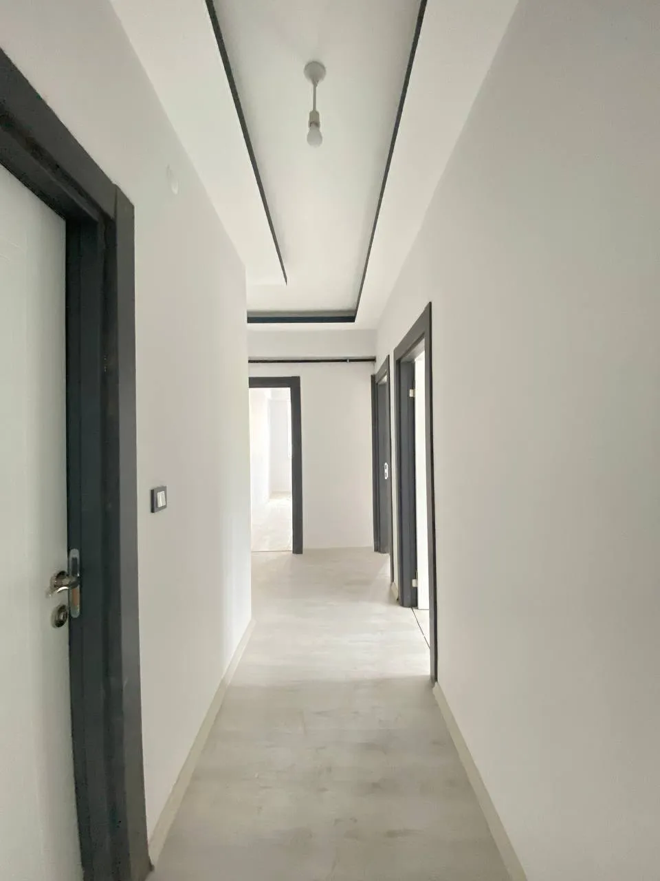 DEVELİ POLAT GAYRİMENKUL- ÇARŞI MERKEZE YAKIN KİRALIK SIFIR GENİŞ 2+1 DAİRE