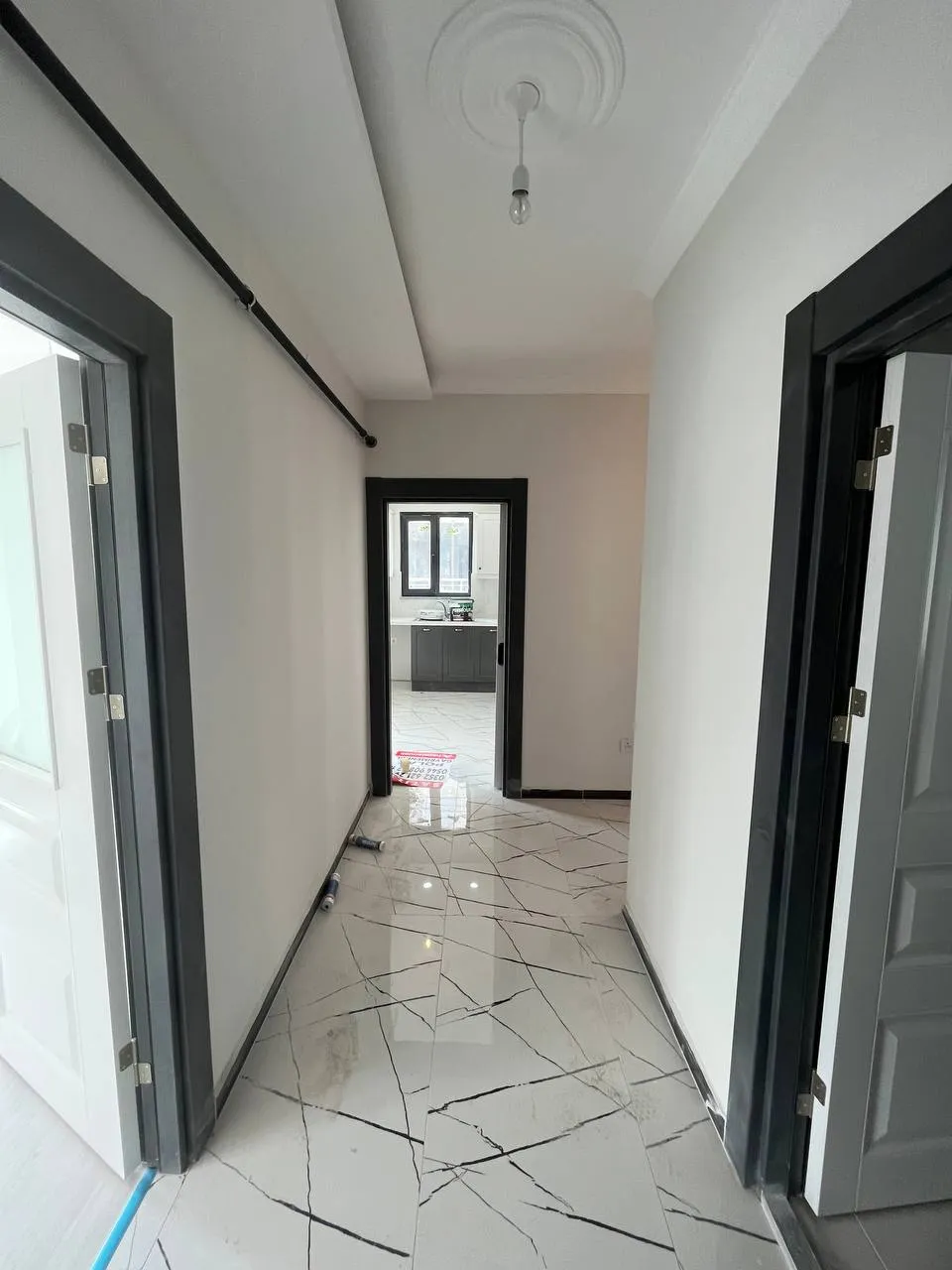 DEVELİ POLAT GAYRİMENKUL- İBRAHİMAĞA MAAH. ÇARŞI MERKEZDE SATILIK ARA KAT DAİRE