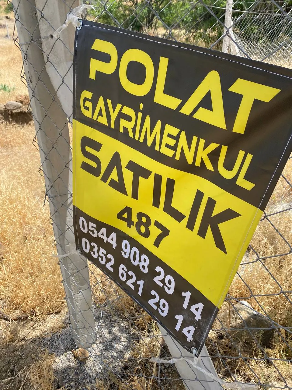 DEVELİ POLAT GAYRİMENKUL-ZİLE MAH. KÖYÖNÜ MEVKİİNDE SATILIK BAĞ BAHÇE